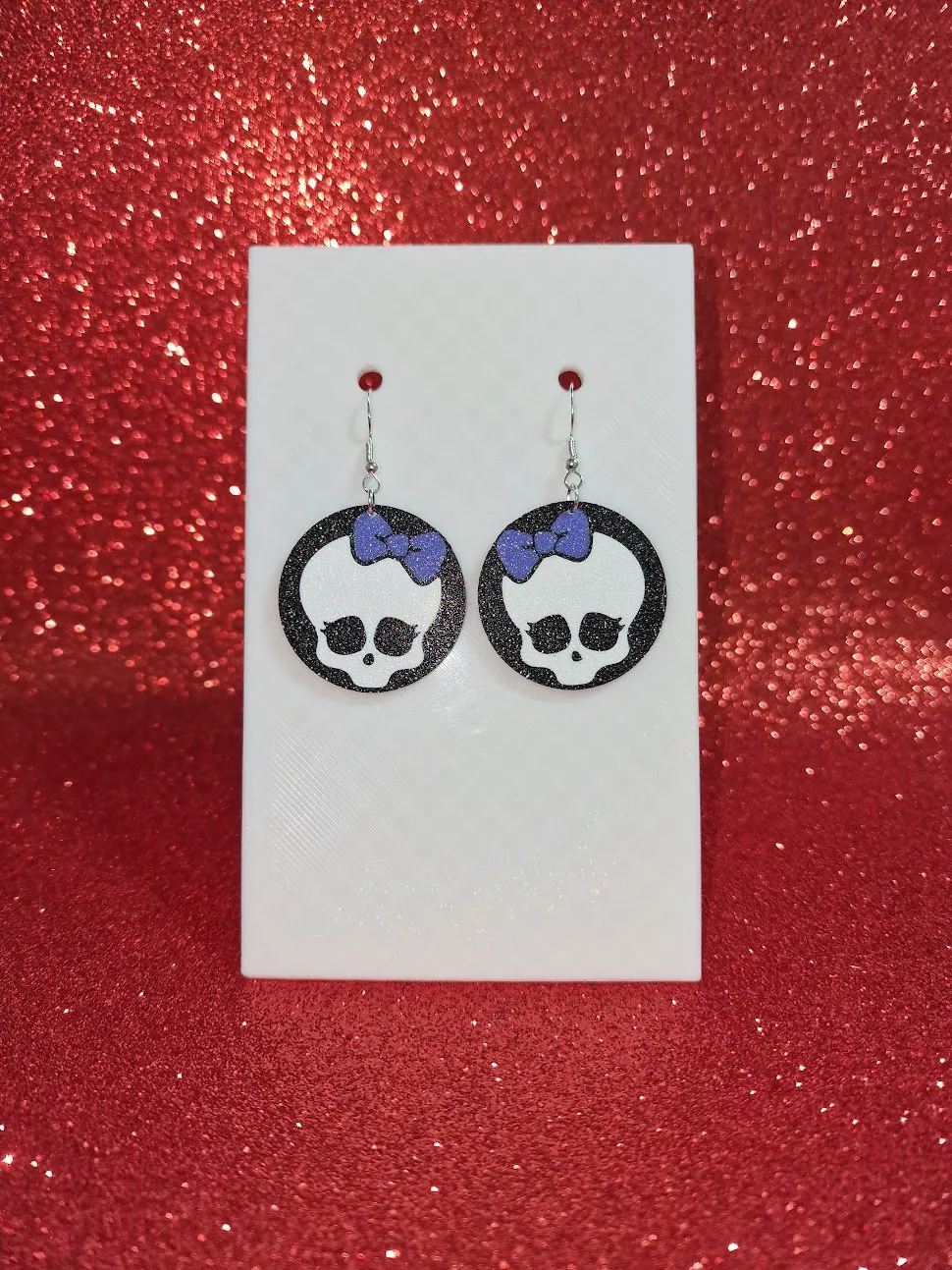 Baby skull earrings view 2