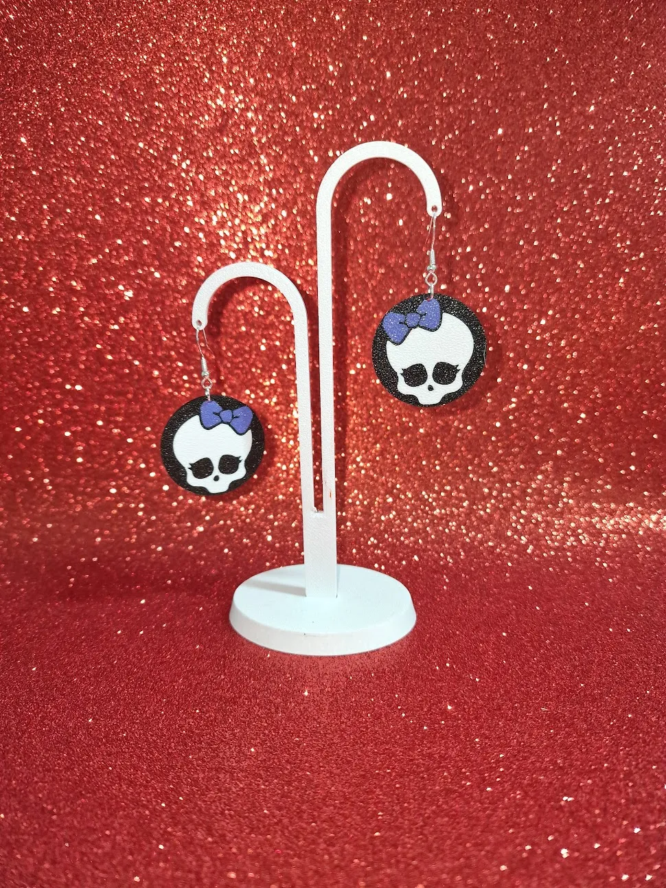 Baby skull earrings view 3