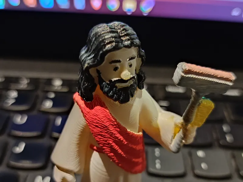Jesus Figurine with Squeegee Clean Windows