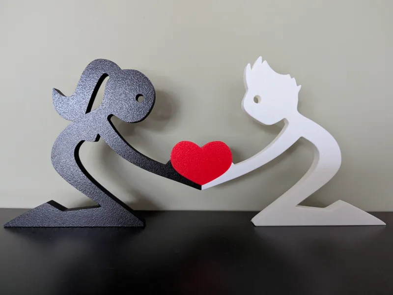 Couple holding a heart