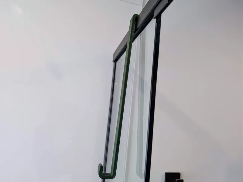 Towel hook for glass pane shower