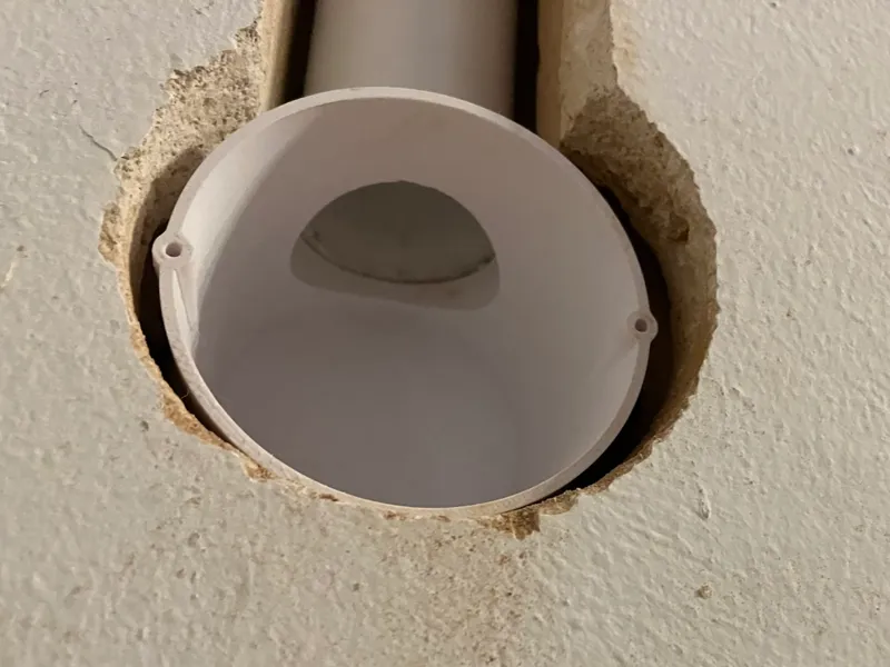 In-wall TV cable - hidden wiring from waste pipe