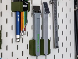 Silicone nozzle cleaner with bbl scraper holder 