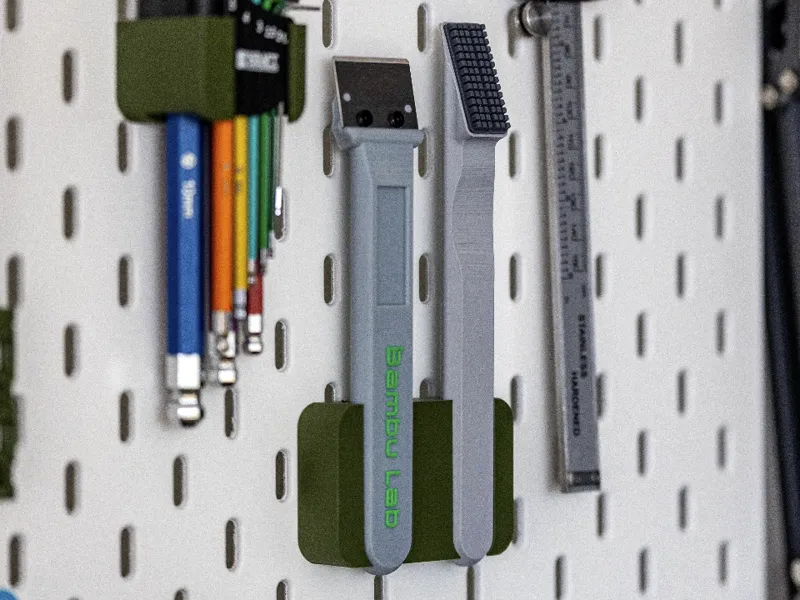 Silicone nozzle cleaner with bbl scraper holder 