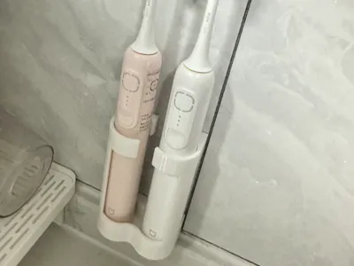 Electric toothbrush holder, dual electric toothbrush holder