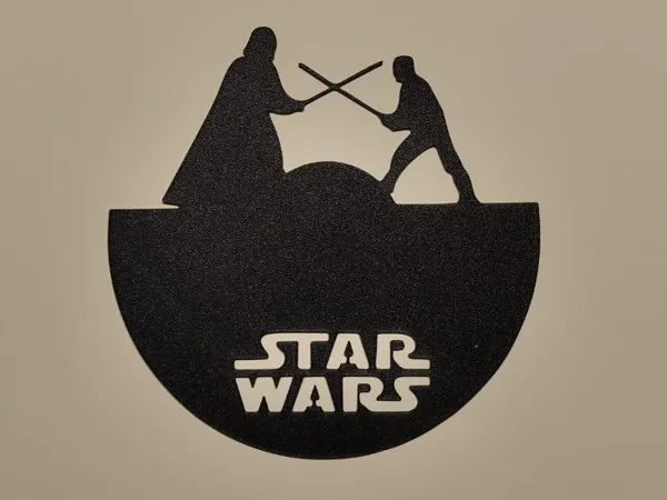 Horloge murale duel de sabres laser