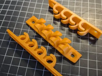 Cable Holder (v1-4) with screwholes (M3,5)
