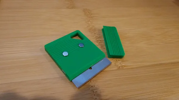 Grattoir à lame de rasoir métallique avec aimants et capuchon
