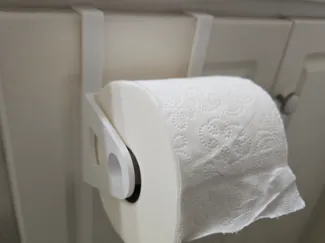 Over the cabinet door toilet paper holder