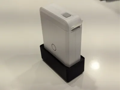 Gridfinity Holder for Nimbot D110 Label Printer 