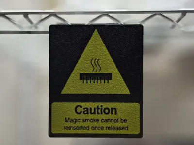 Magic Smoke Warning – Funny Electronics Gag Sign