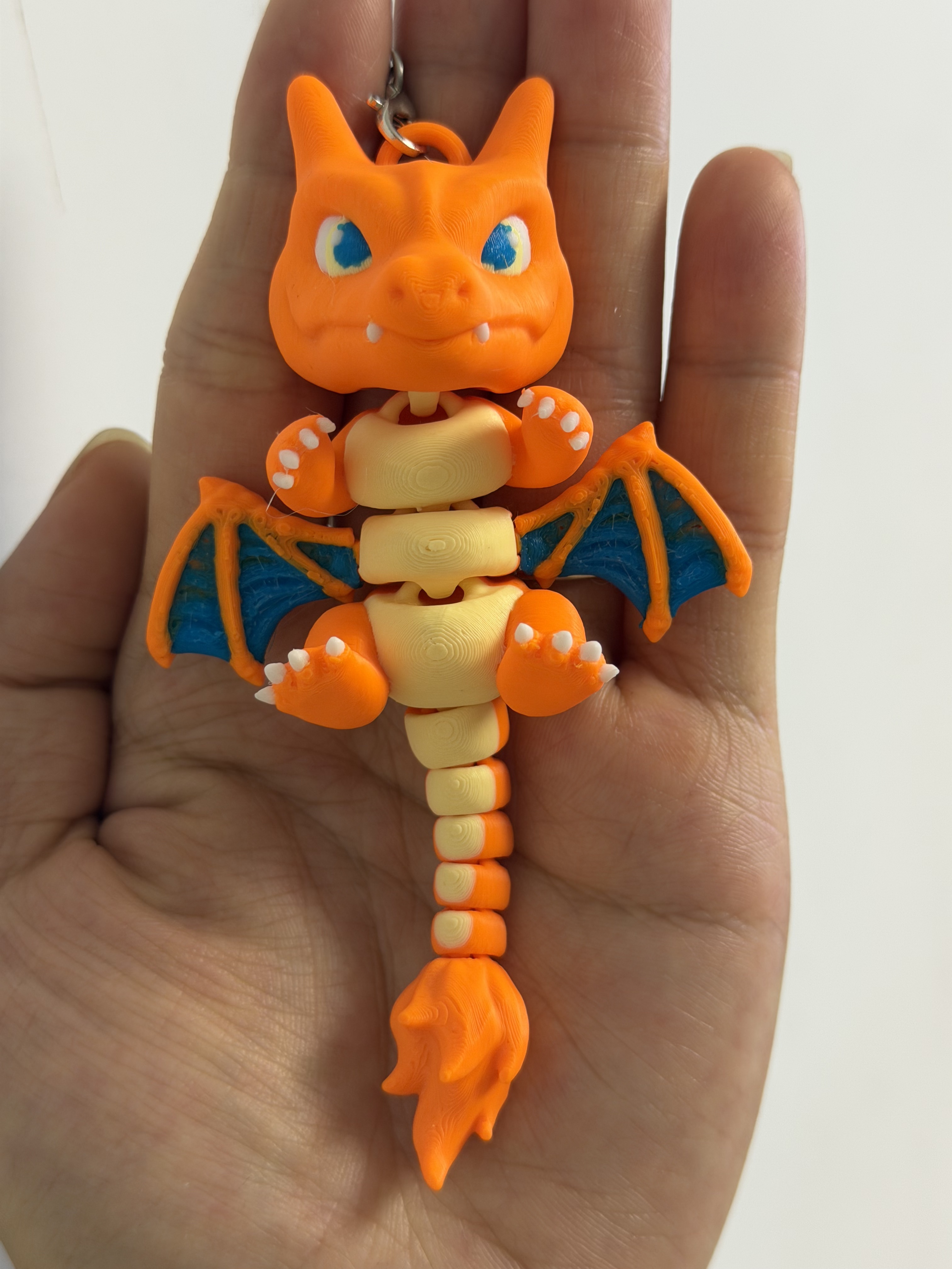 Miniatura 1 do modelo 3D 喷火龙铰链可动钥匙扣