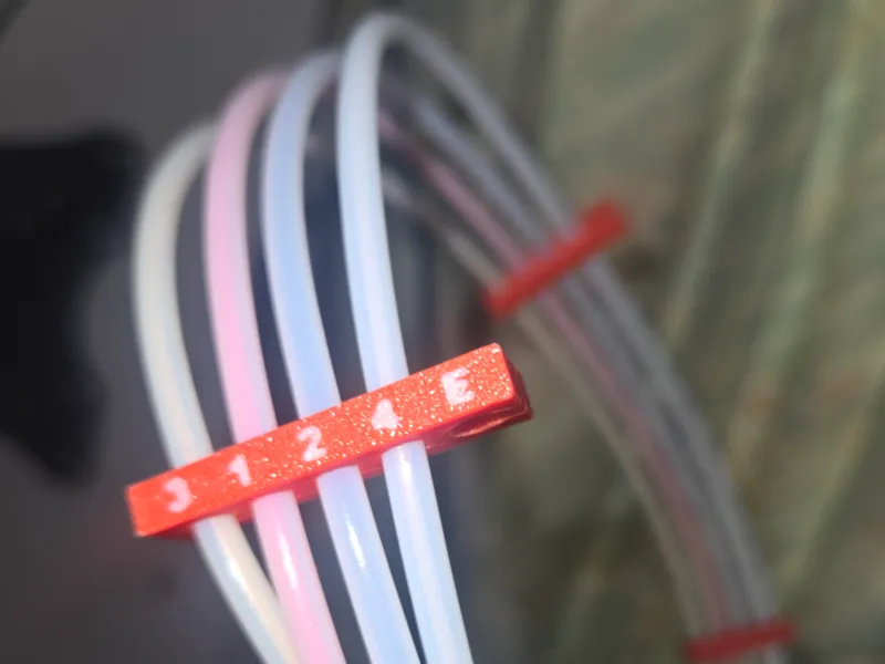 A1 filament spacer and guide