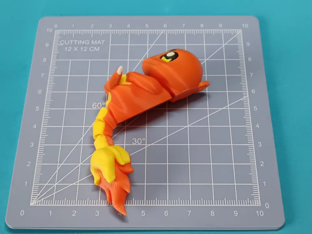 Flexi Charmander Articulated Keychain - Free 3D Print Model - MakerWorld