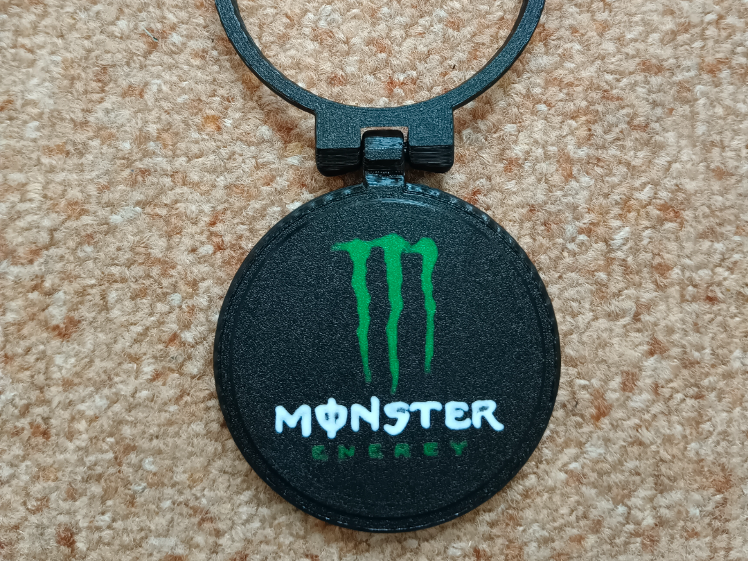 removable Monster emblem to lid metal cans