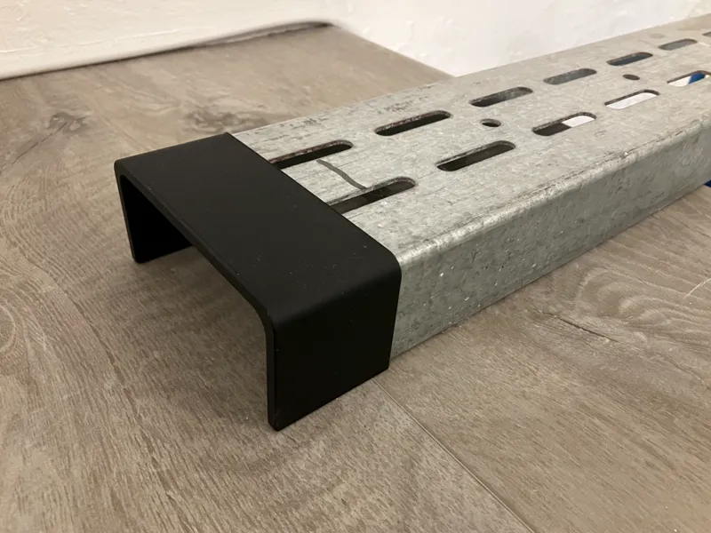 Steel profile end cap