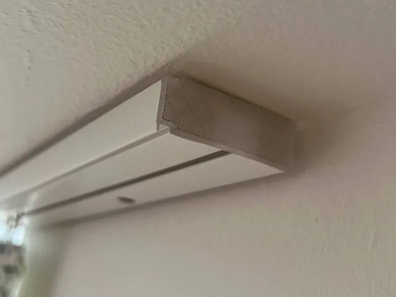 End cap for curtain track