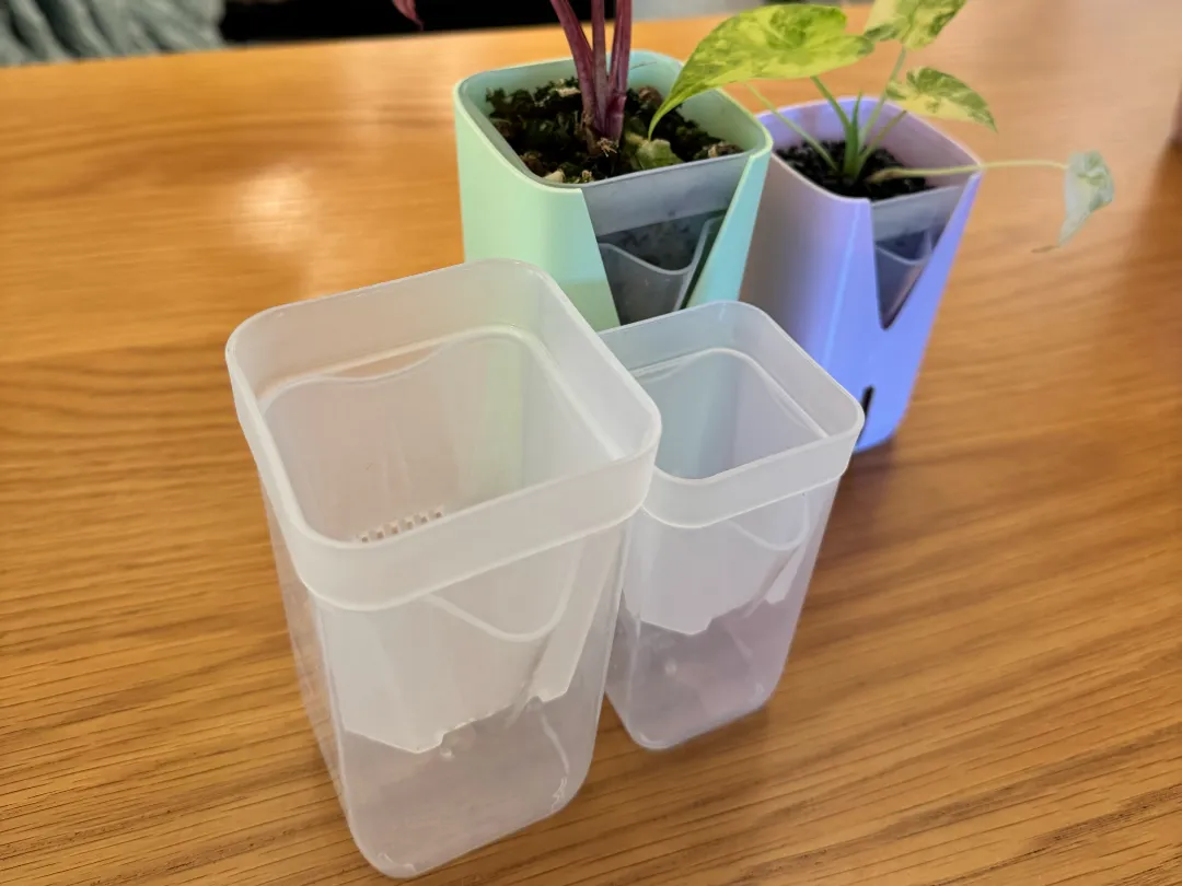 Manchons décoratifs pour pots à réservoir d'eau