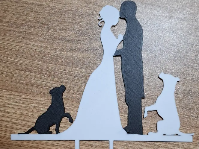 wedding cake topper with 2 dogs