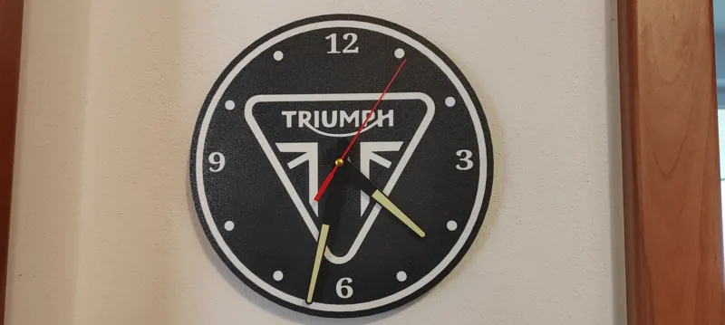 Triumph Clock flat