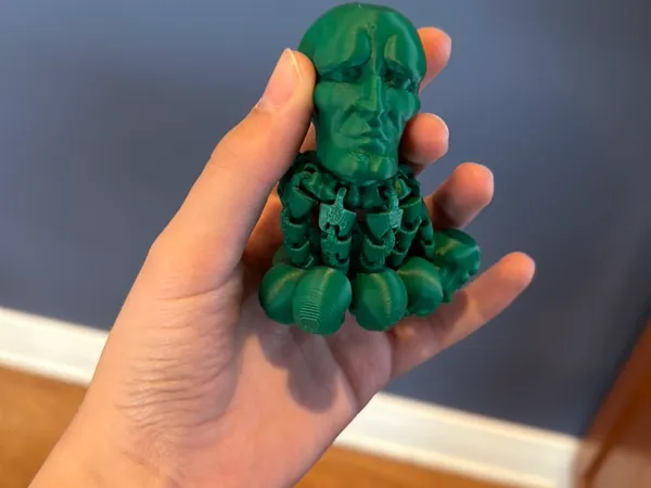 Poulpe Squidward avec pattes sur la tête