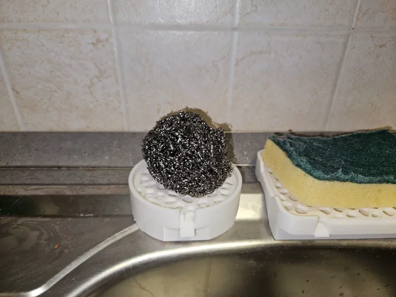 Metal scourer holder