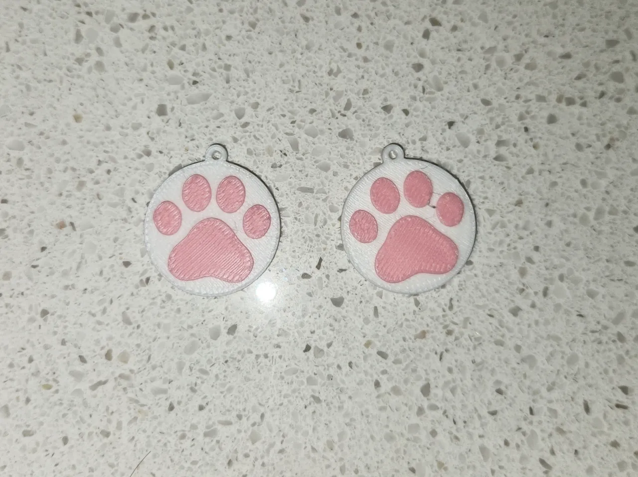 Cat paw print earrings view 2