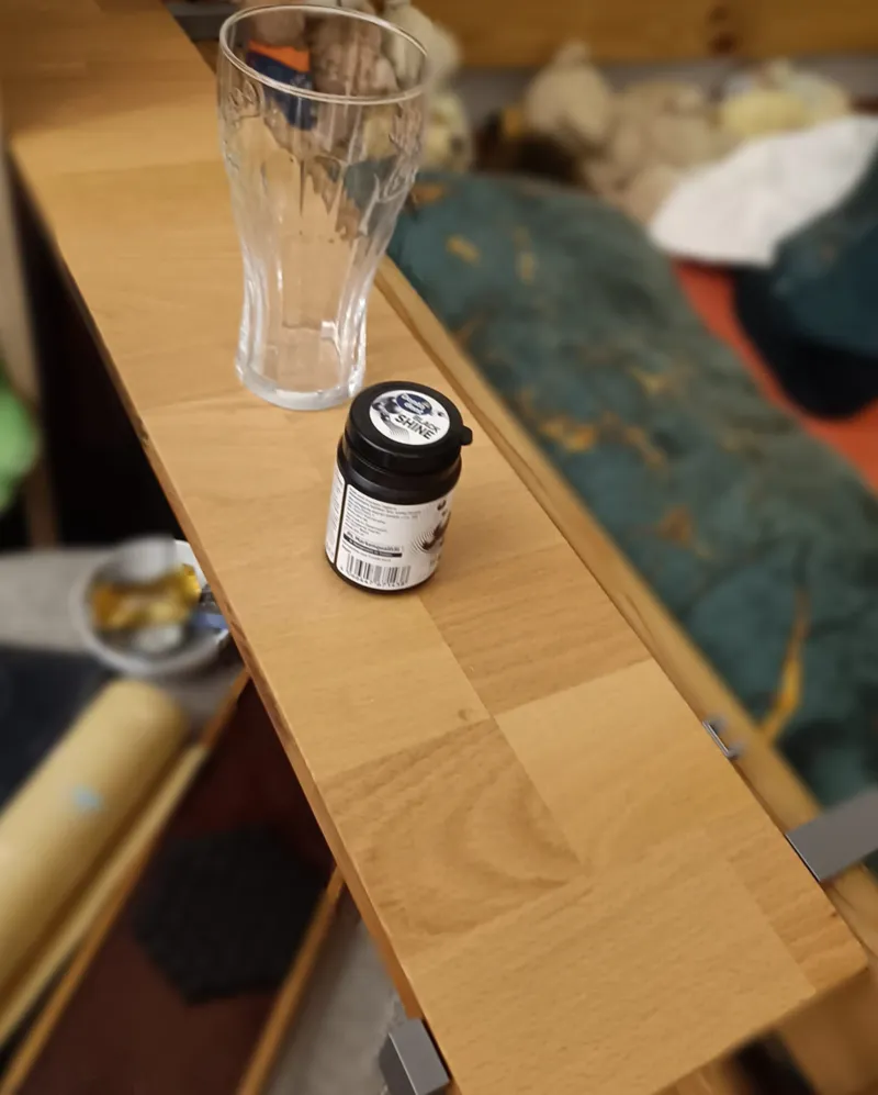 Shelf bracket for bed
