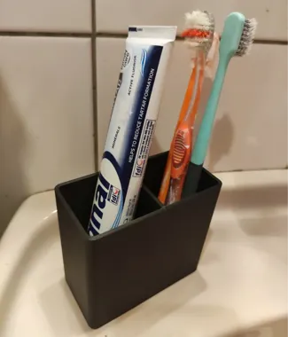 Toothbrush and toothpaste holder