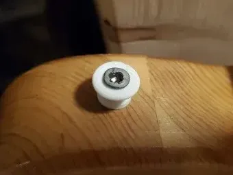 Guitar strap button