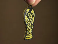 llavero dorado con negro