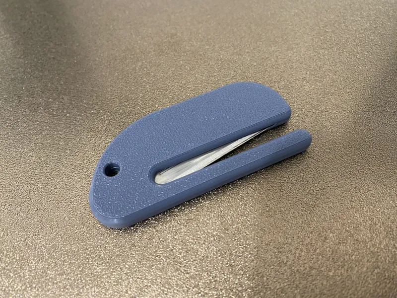 Paper / box cutter with internal blade