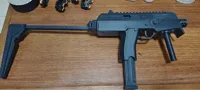 Réplique jouet de pistolet-mitrailleur MP9 miniature (accessoire cosplay) — photo 2