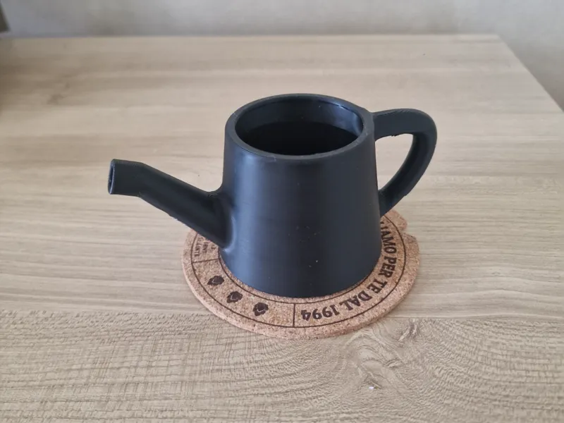 Tiny watering can