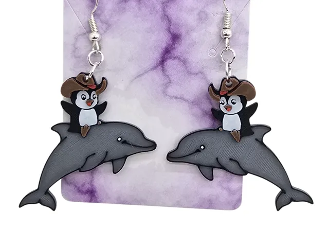 Penguin riding a dolphin Earrings