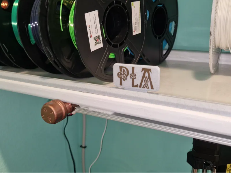 Raised Shelf Edge with Movable Filament Labels