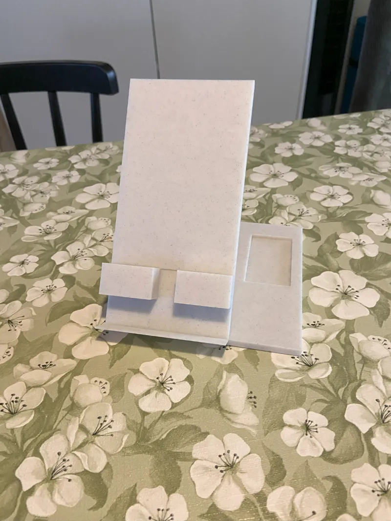 Phone stand holder with space for charging cable