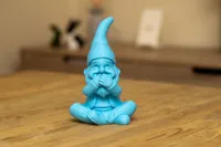 A “speak no evil” gnome