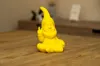 Rude gnome showing the middle finger