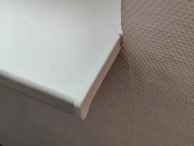 End cap for a window sill profile