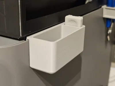 Waste bin for cleaning strips with scraper