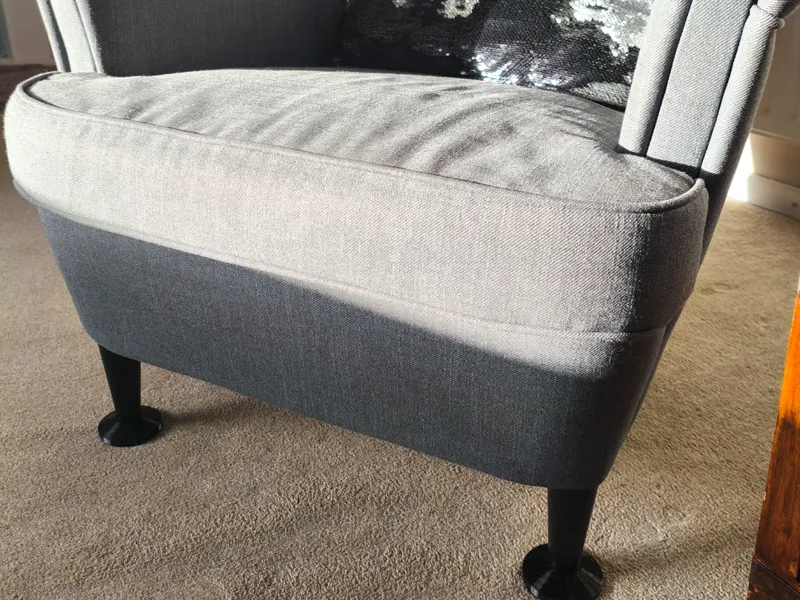 IKEA Strandmon armchair foot cup carpet slide