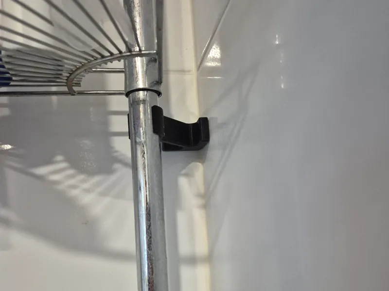 Shower rack stabilizer