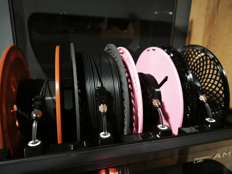 Slim filament dust filter for AMS
