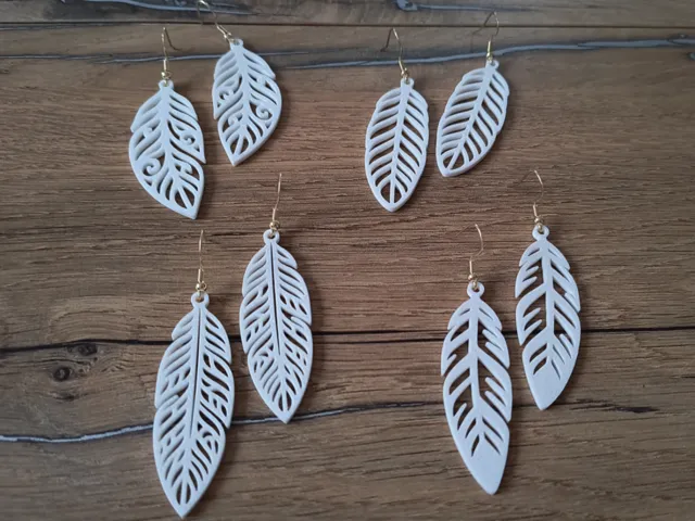 4 different elegant feather earring (free to sell)