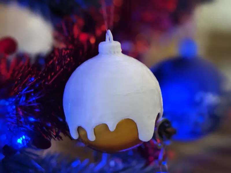 Christmas bauble in the snow - Ornament
