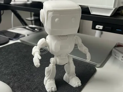 Cutie Robot Smiles: Adorable Tiny Droid Buddy!