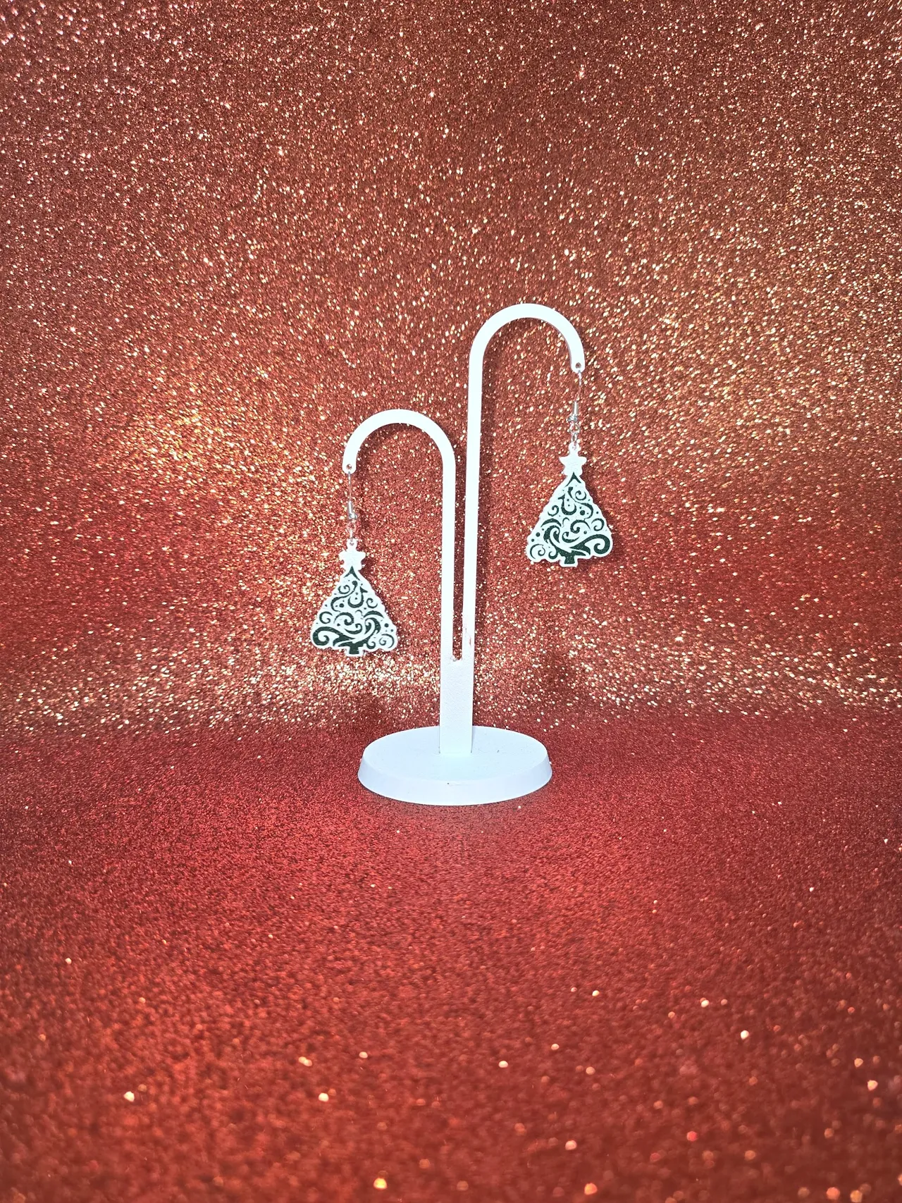 Snow-covered Christmas tree earrings view 3