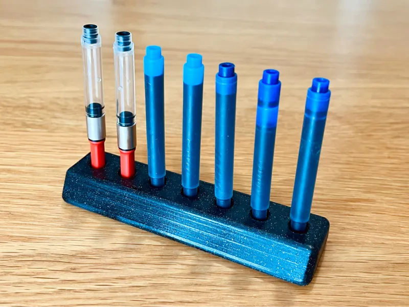 Fountain pen ink cartridge rester