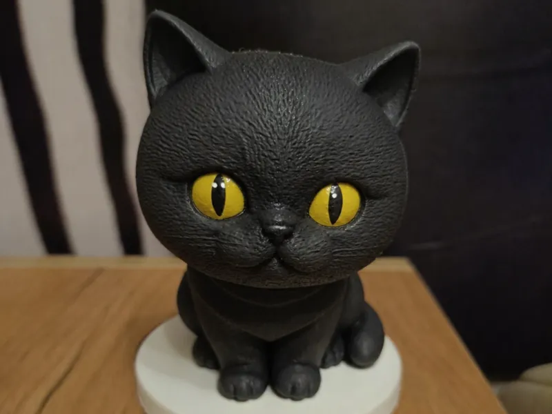 Black Cat Figurine with Yellow Eyes